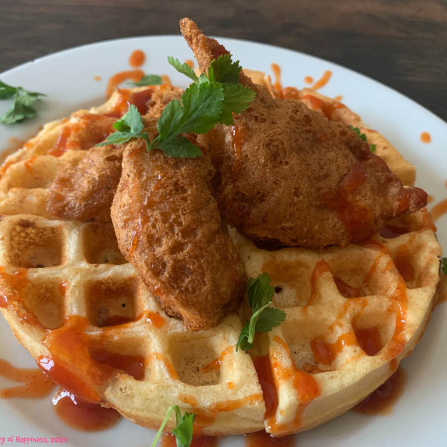 Gluten-free waffles with fried chicken.
