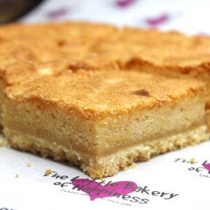 Send the gift of happiness with a box of our gluten-free Bakewell shortbread cake slices.