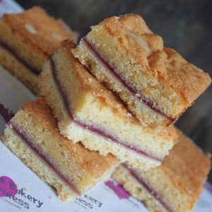 Send the gift of happiness with a box of our gluten-free Bakewell shortbread cake slices.