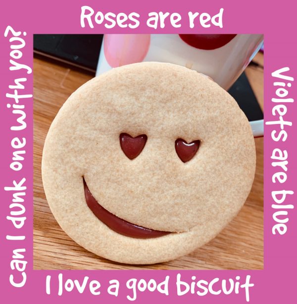 Handmade happy heart face vanilla biscuits sandwiched together with raspberry caramel. The perfect Valentine's Day gift.
