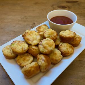 An easy recipe for gluten-free cheese and ham muffin bites from The Little Bakery of Happiness